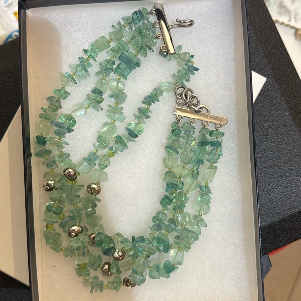 Mignon Faget snail & teal stone necklace.
